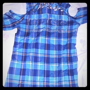 A long-sleeve plaid t- shirt